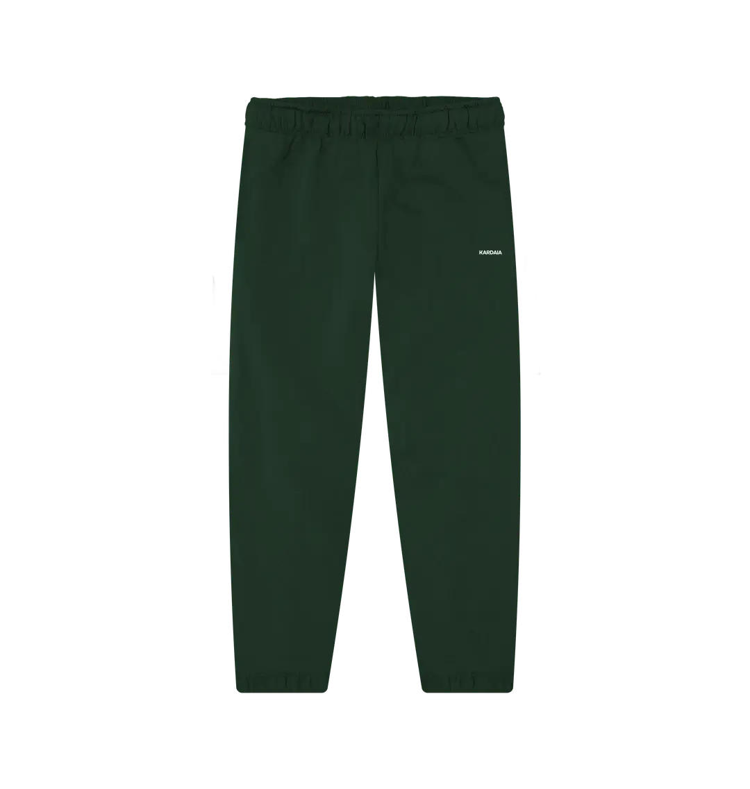 jogging vert foncé femme en coton bio présenté à plat avec logo KARDAIA