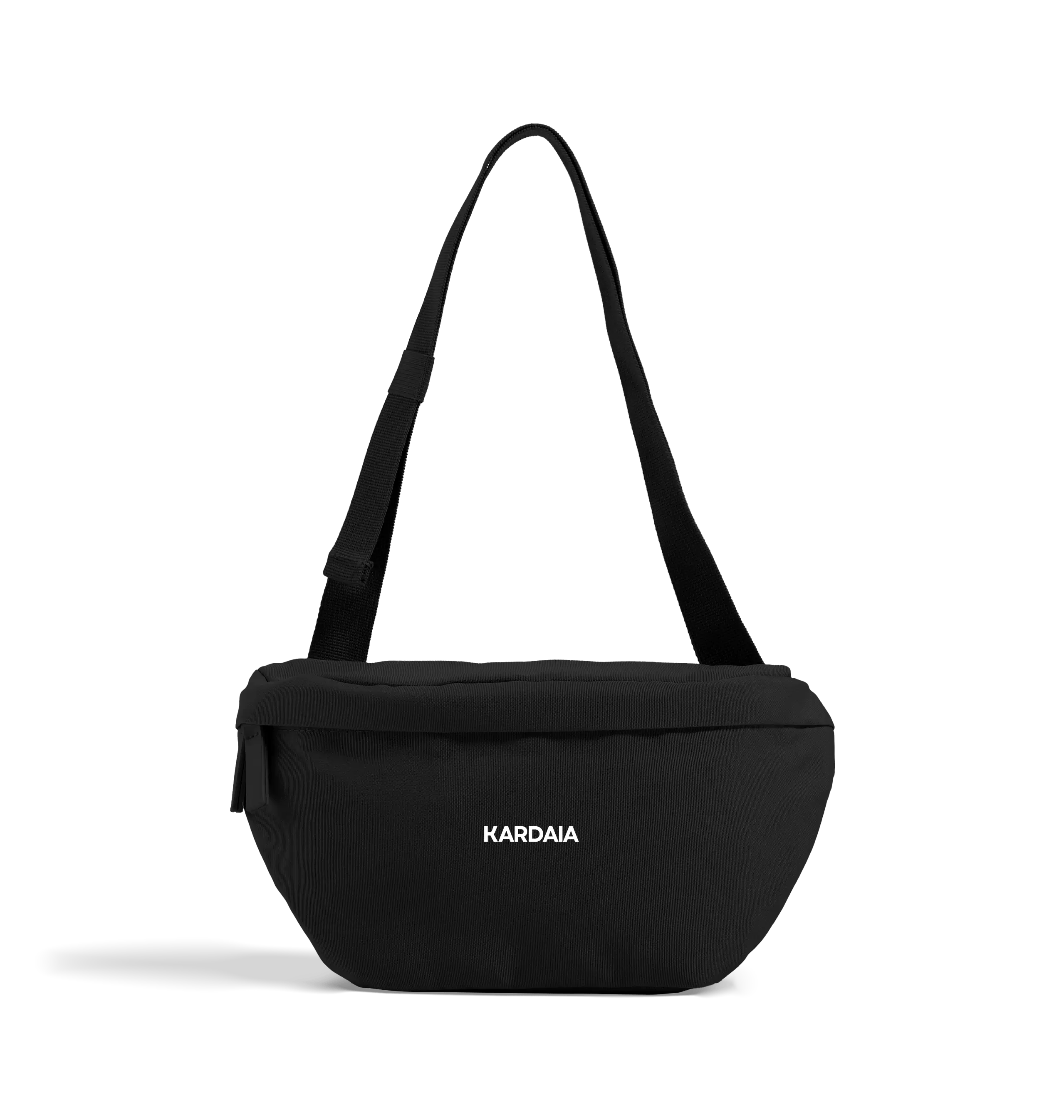 Sac banane noir en coton biologique avec bandoulière réglable, présenté en studio sur fond sombre