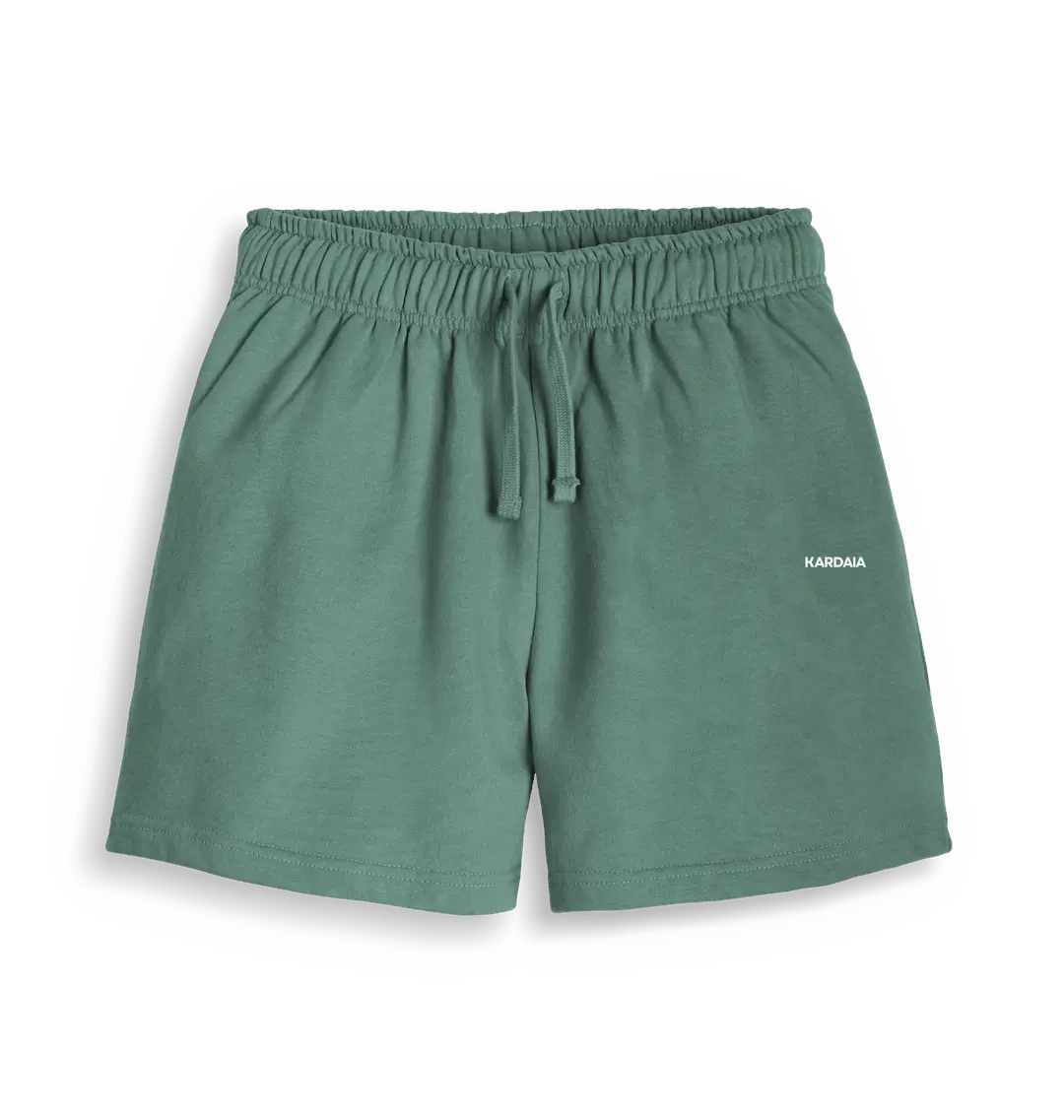 short femme vert en coton bio certifié, vu à plat, logo KARDAIA visible